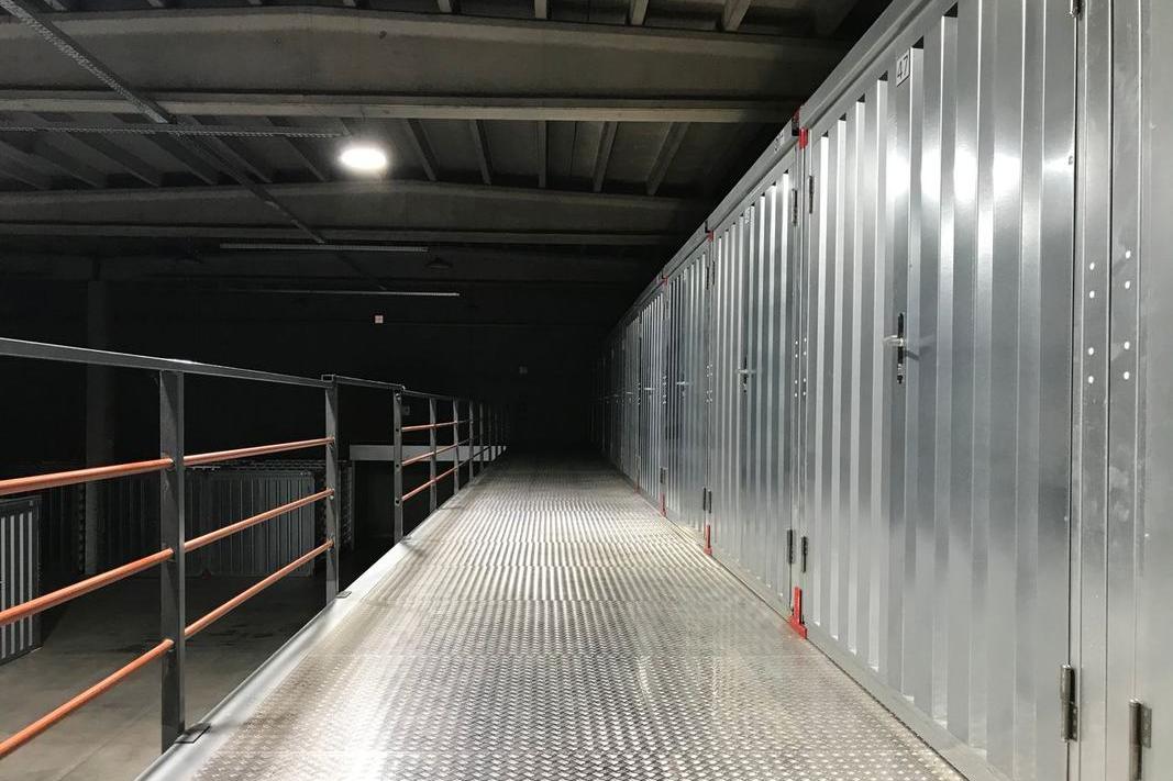 Warehouse corridor where a time attendance machine records gate hours